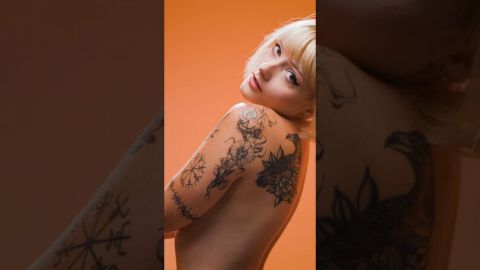 Nude Photoshoot Wrapped in Gold Art